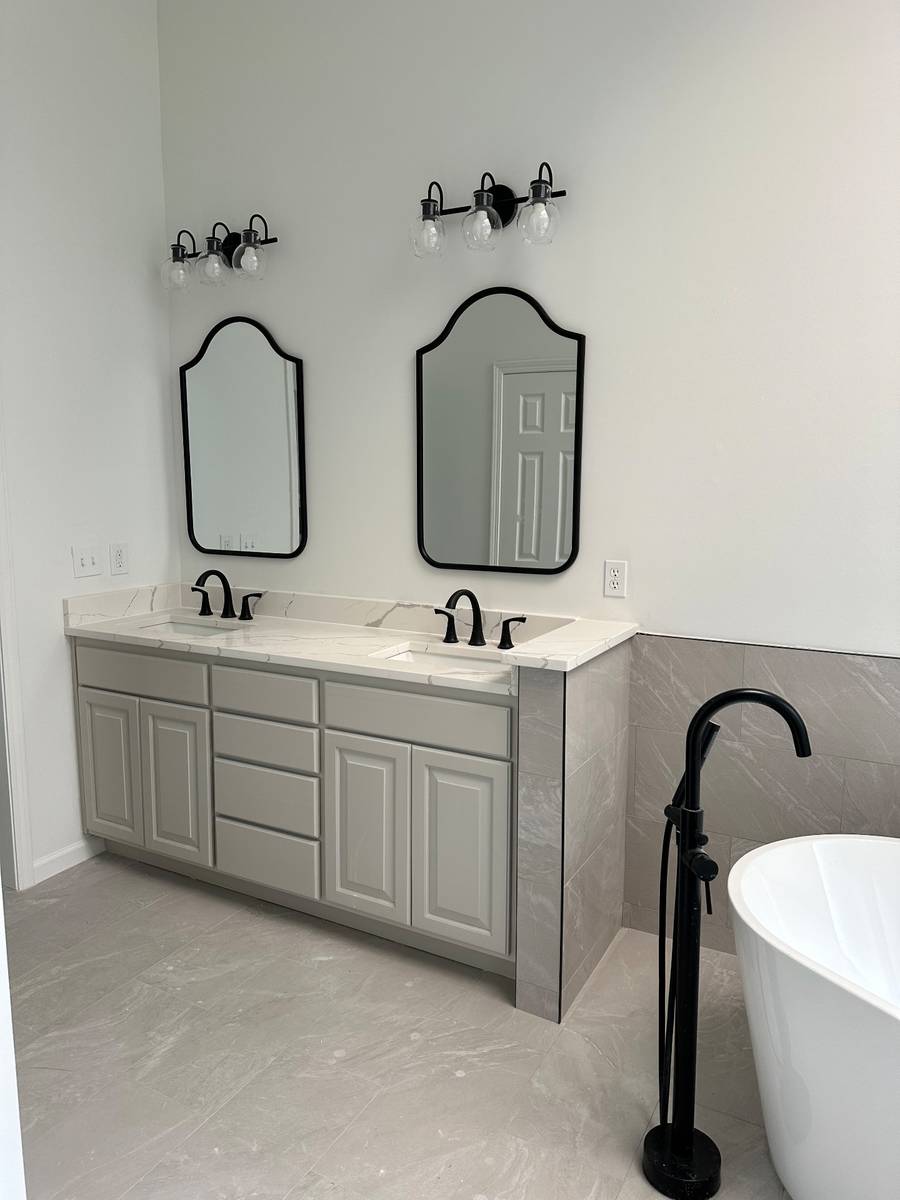 Greige Vanity & Freestanding Soaking Tub