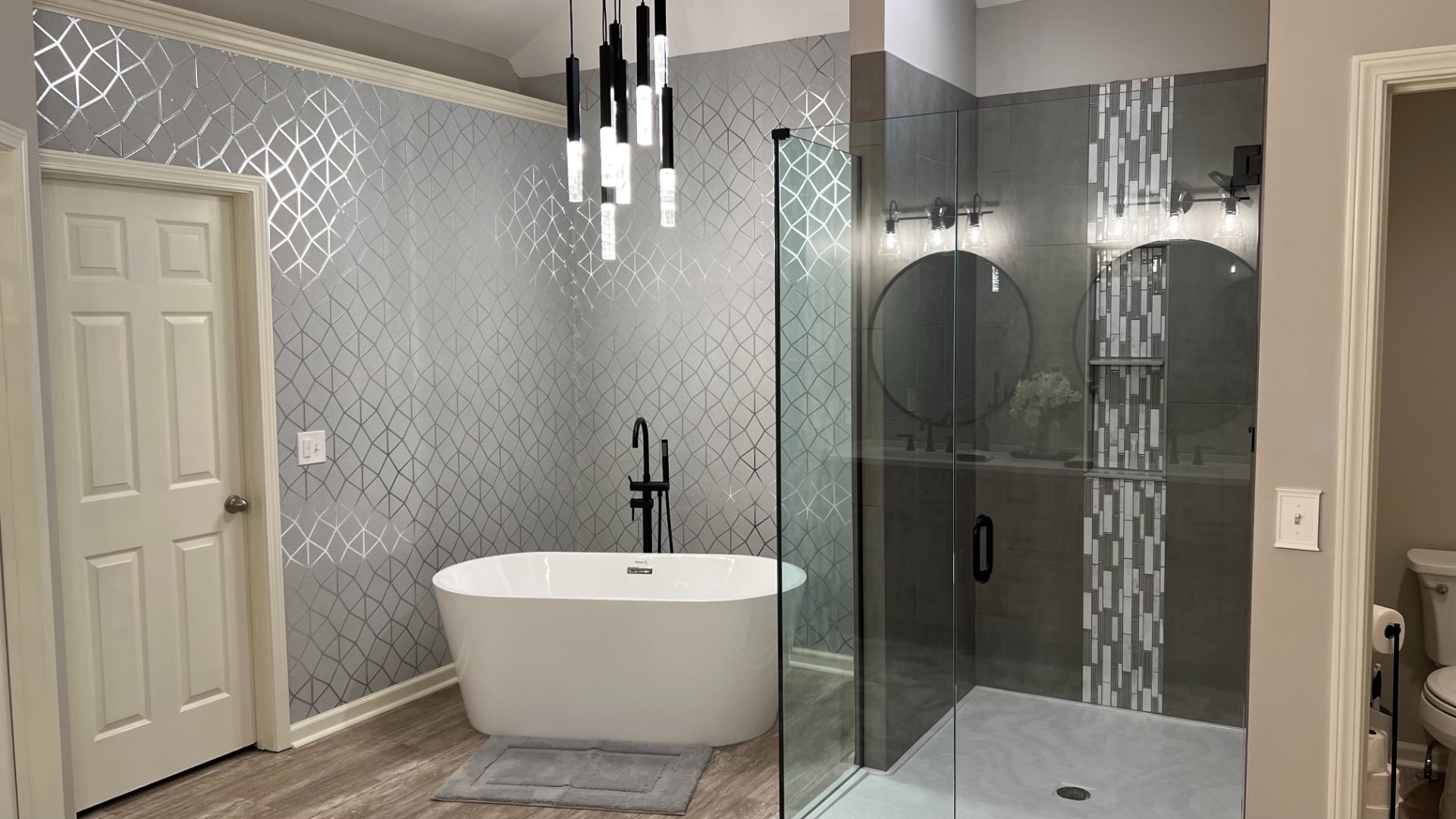 Freestanding tub and glass shower after the bathroom remodel