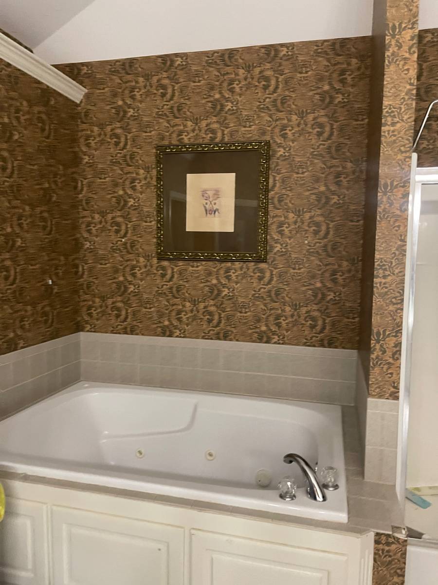 Dated bathroom before the Revived Spaces remodel