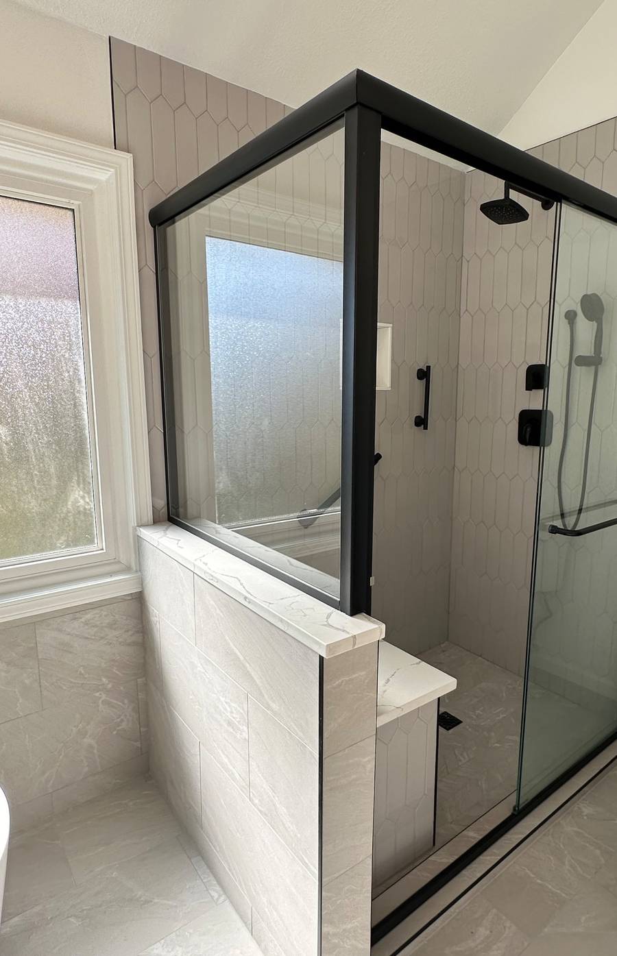 Picket Tile Shower with Black Frame Glass