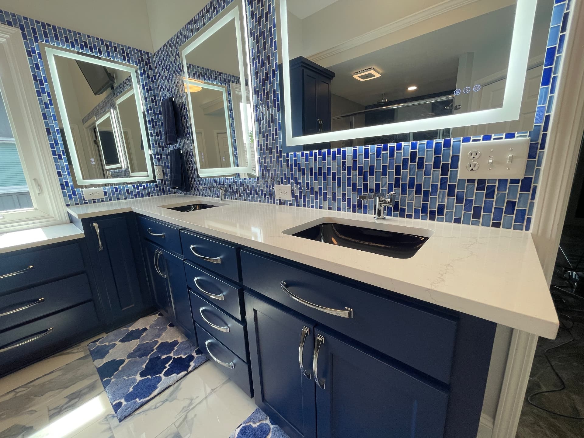 Blue stone slab primary bathroom remodel in Overland Park by Revived Spaces
