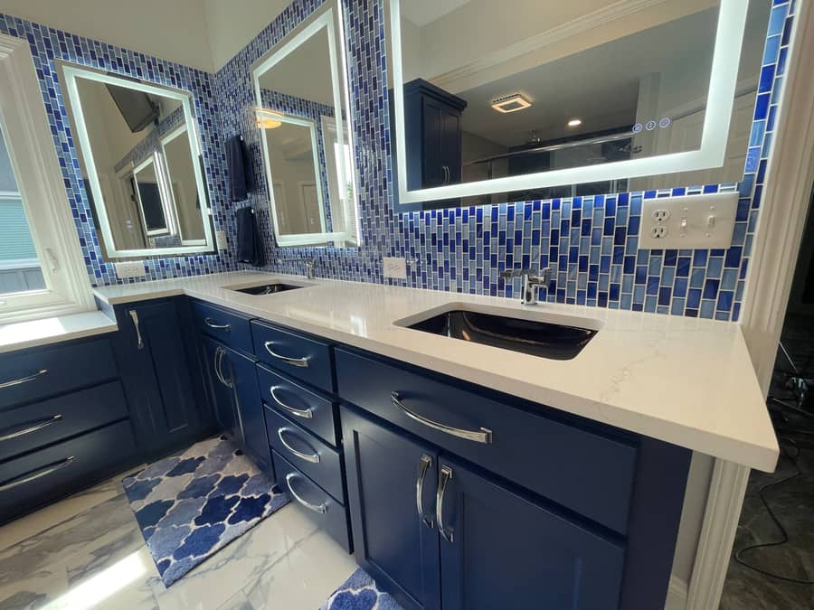 Blue stone slab primary bathroom remodel in Overland Park by Revived Spaces